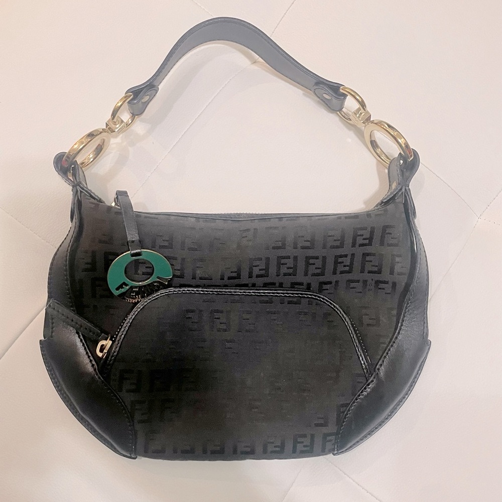 Classic black authentic Fendi Bag with gold hardware.